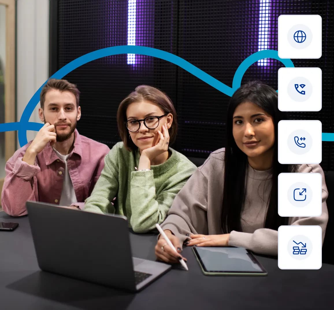Three colleagues using laptops and tablets to explore virtual phone number solutions